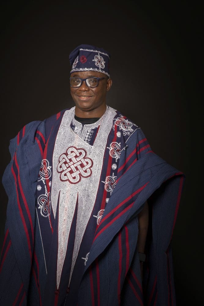 Studio portrait of a man wearing traditional cultural clothing during a family photoshoot in Birmingham