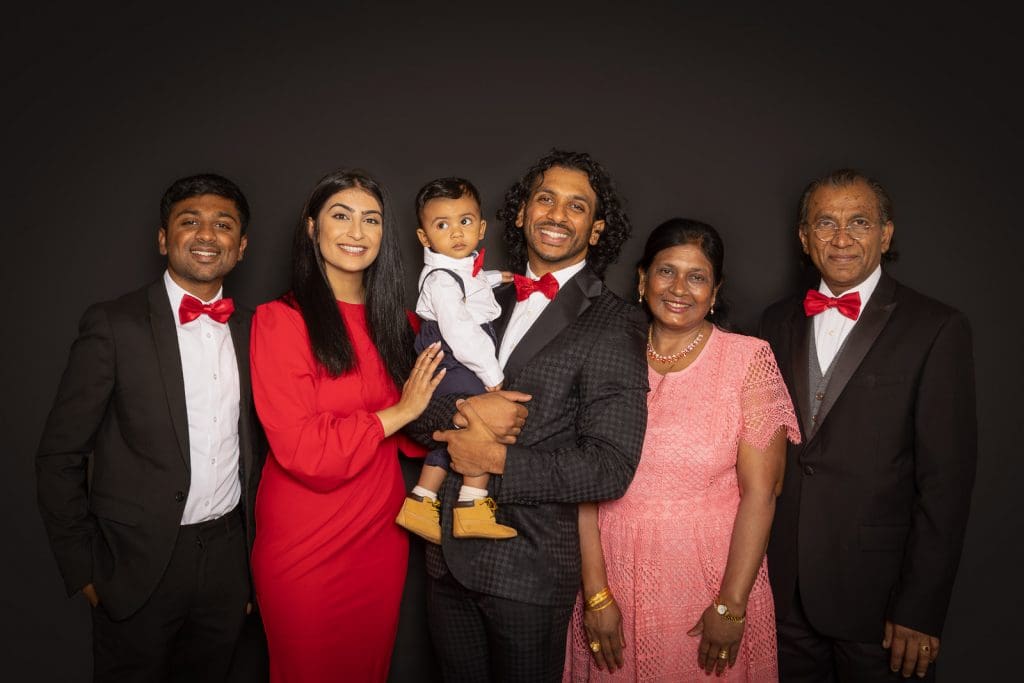 Multi-generation family portrait with baby at a Birmingham family photoshoot