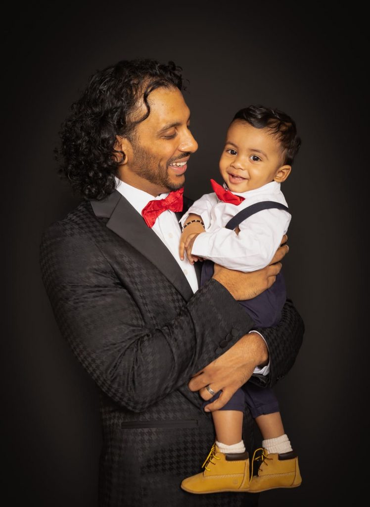 Father holding his son during a professional family photoshoot in Birmingham