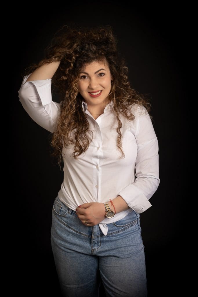 Modelling portfolio portrait of a woman with curly hair in Birmingham studio