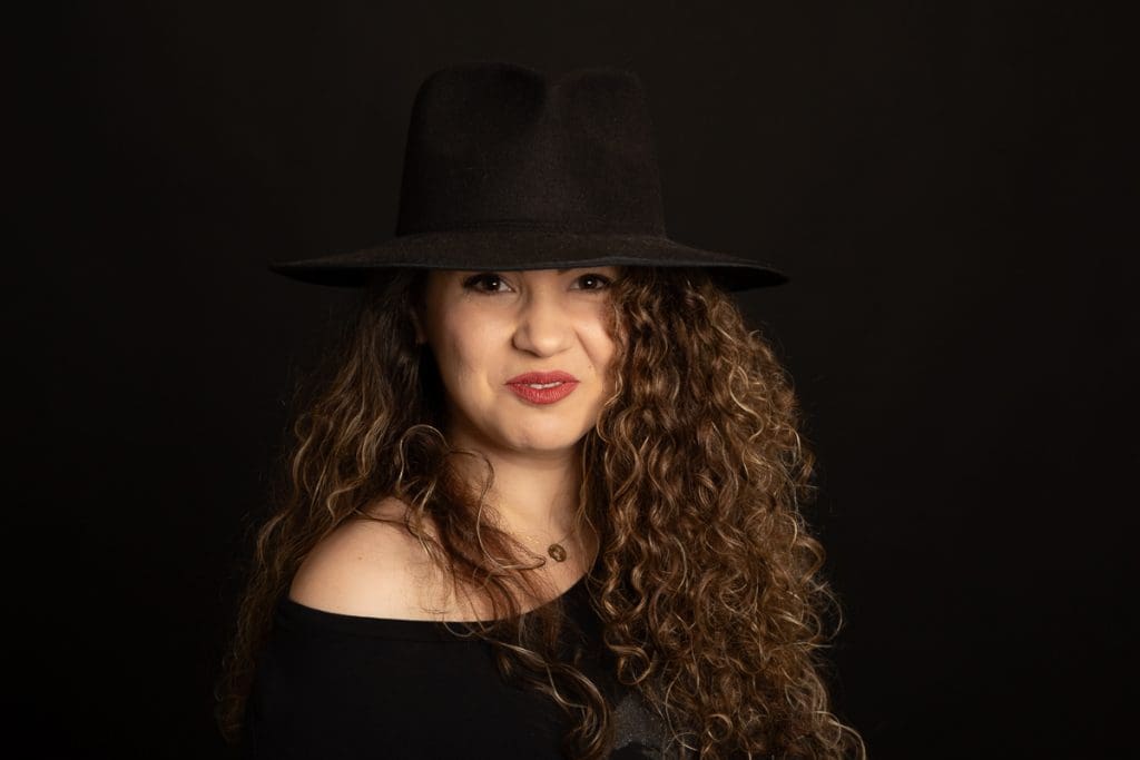 Creative studio portrait with natural posing