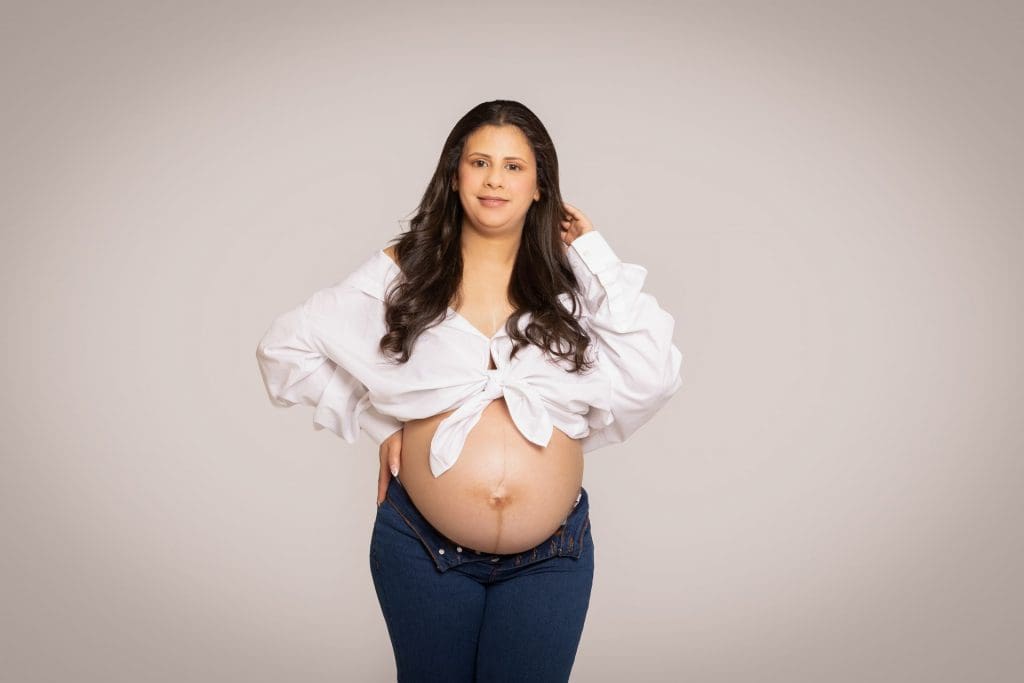 Relaxed maternity session capturing confidence without stiff posing