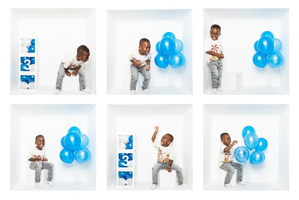 Six photos by a Birmingham inside the box photographer feature a young boy in a white box with blue balloons and cubes showing the number three. He poses playfully—smiling, sitting, crouching, and reaching for the balloons in different positions.